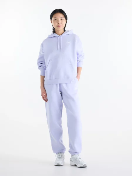 Спортивні штани New Balance Sport Essentials Fleece бавовна/поліестер фіолетовий