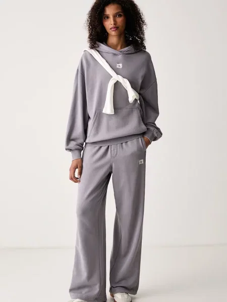 Calvin Klein Jeans pulover s kapuco z bombažem siva