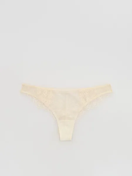Reserved Мереживні стрінги кремовий 