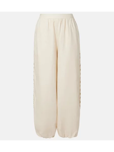 Pantaloni Simkhai de in bej
