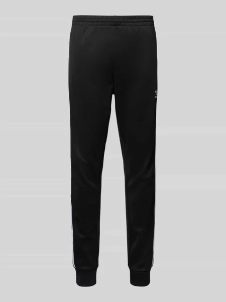 Spodnie treningowe o kroju regular fit z wyhaftowanym logo Adidas Originals biały