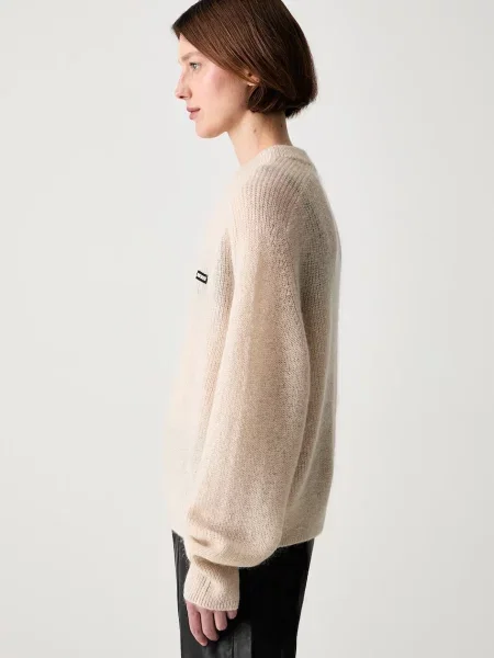 Rotate LIGHT KNIT LOGO sweter z wełną beżowy