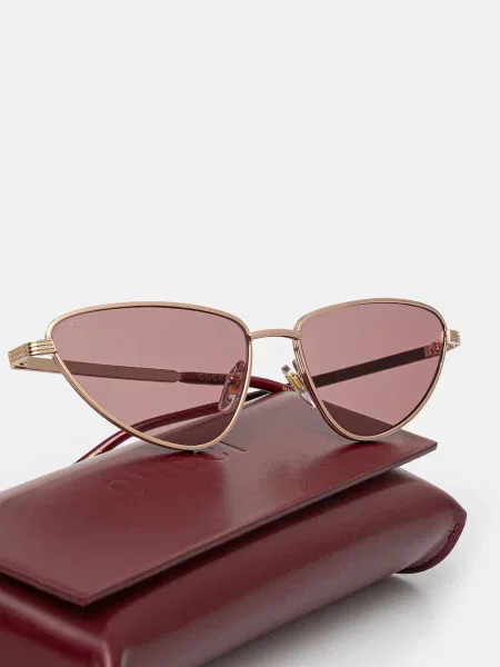 Солнцезащитные очки Gucci золотые