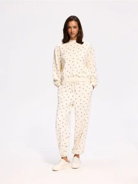 Reserved Pantaloni sport cu conținut ridicat de crem
