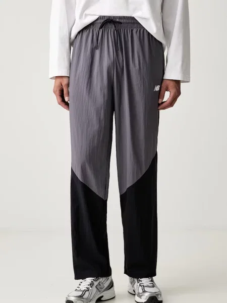 New Balance pantaloni de trening pentru bărbați violet