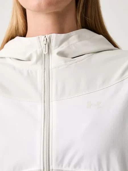 Under Armour átmeneti kabát női Rival Woven bézs