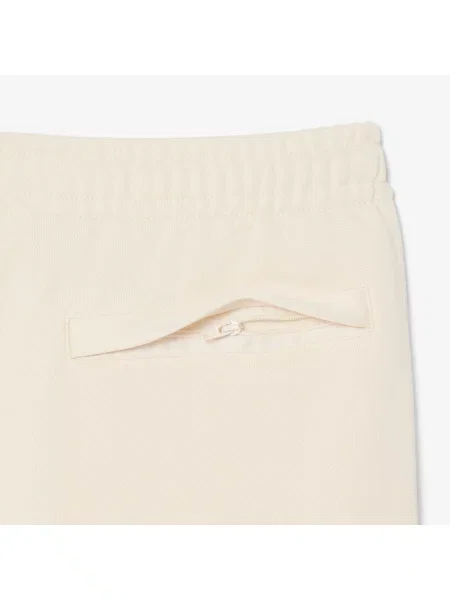 Lacoste Spodnie Dresowe Piqué Z Ozdobną Lamówką beżowy