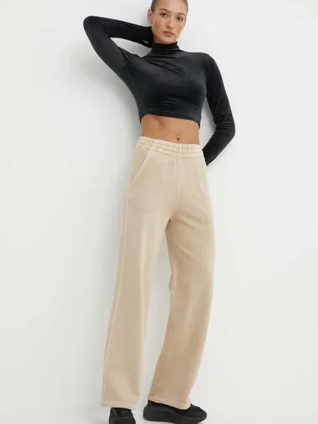 Donji dio trenirke adidas Originals bez uzorka bež
