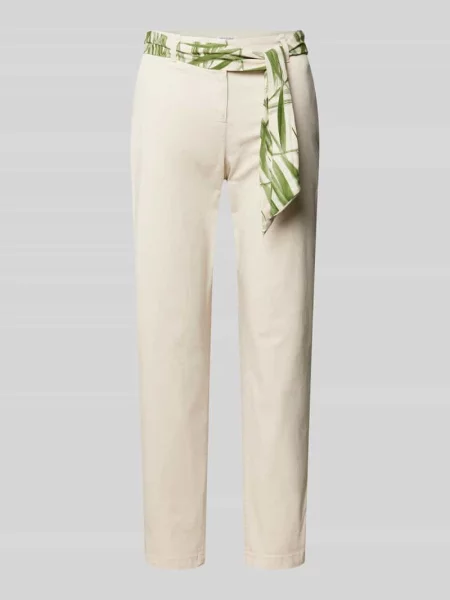 Chinosy o kroju slim fit z wiązanym paskiem Christian Berg Woman