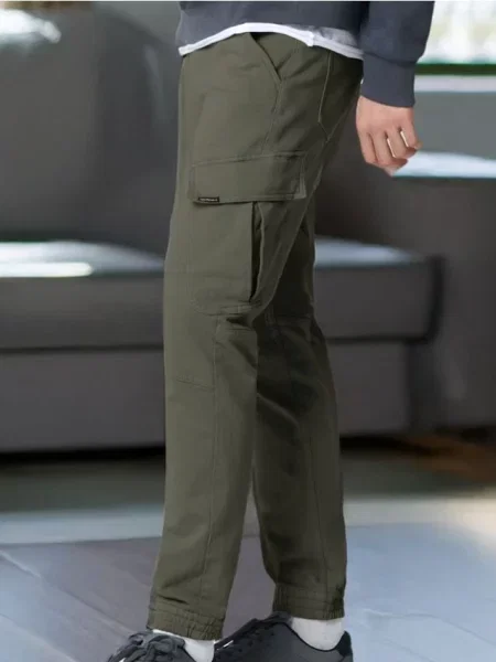 Sinsay Džíny regular jogger fit tmavě zelená