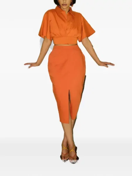 Midi sukňa Andrea Iyamah oranžová