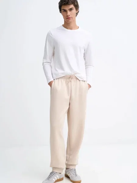 Спортивні штани adidas Stadium з принтом бежевий