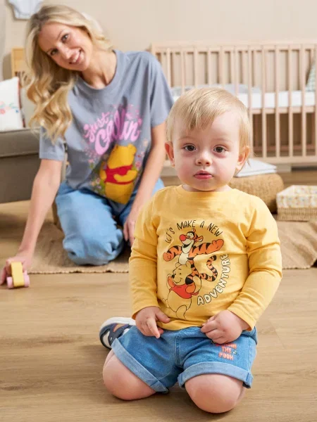 Sinsay Džínové šortky Winnie the Pooh indigo jeans
