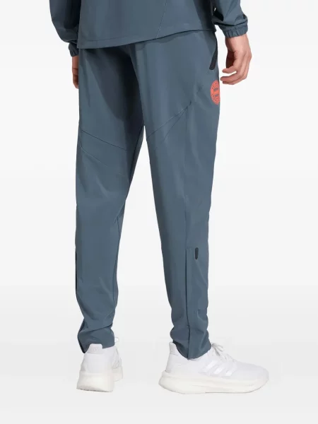 Pruhované kalhoty Adidas s potiskem černé