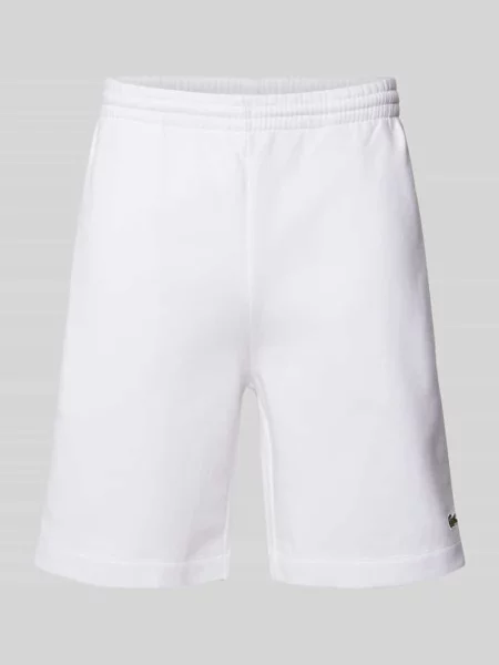 Szorty z dzianiny dresowej o kroju regular fit z naszywką z logo Lacoste białe