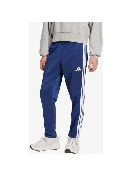 Spodnie długie adidas Tricot Regular Tapered niebieskie XS białe