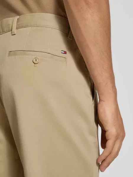 Chinosy o kroju regular fit z mieszanki bawełny model ‘DENTON’ Tommy Hilfiger beżowe