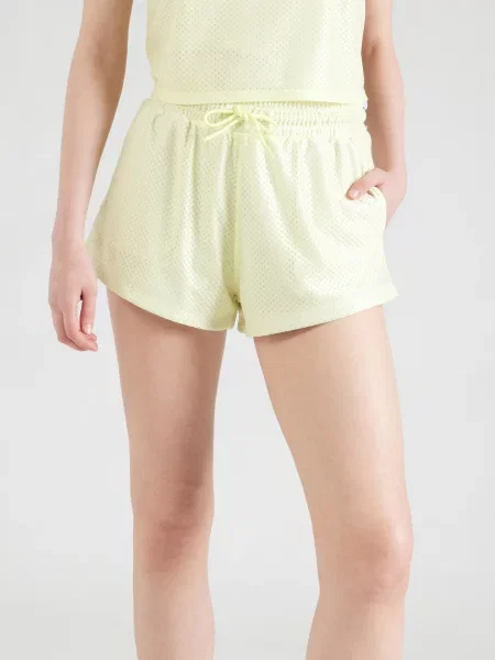 Calvin Klein Jeans Pantaloni PRIDE verde pastel alb