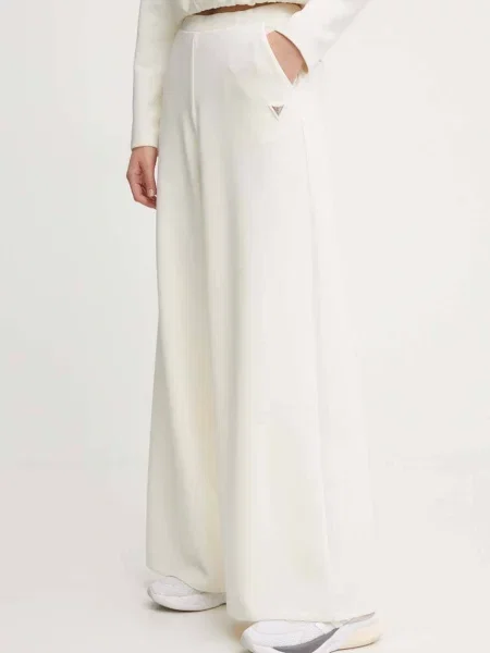 Guess Spodnie dresowe Olympe beżowy