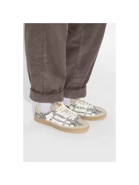 Sneakersy Amiri skórzane w wężowy wzór beżowe