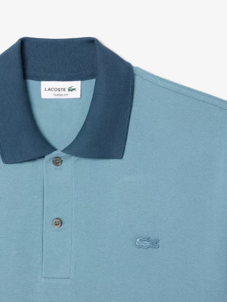 Поло Lacoste синій