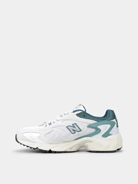 Кожаные кроссовки New Balance белые