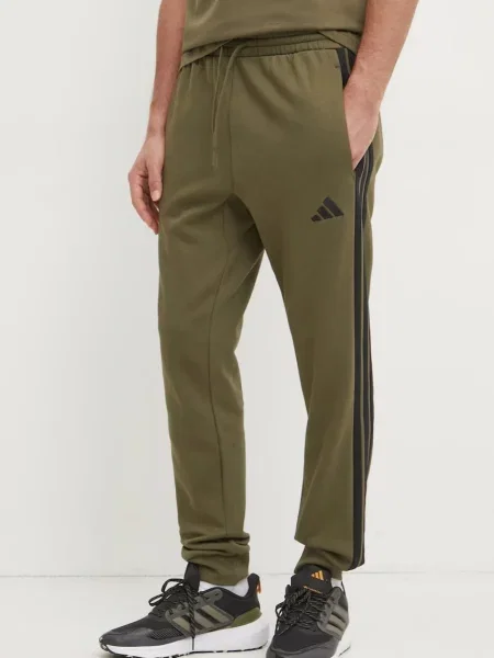 Donji dio trenirke adidas Essentials s uzorkom zelena