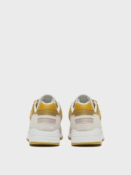 Замшевые кроссовки Saucony желтые