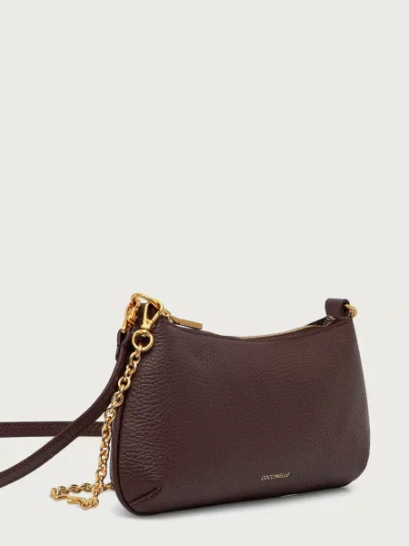 Geanta crossbody Coccinelle din piele violet