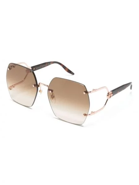 Saulės akiniai Gucci Eyewear ruda