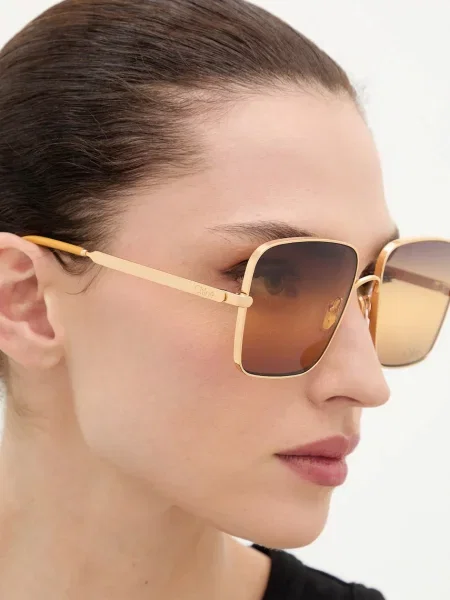 Солнцезащитные очки Chloé золотые