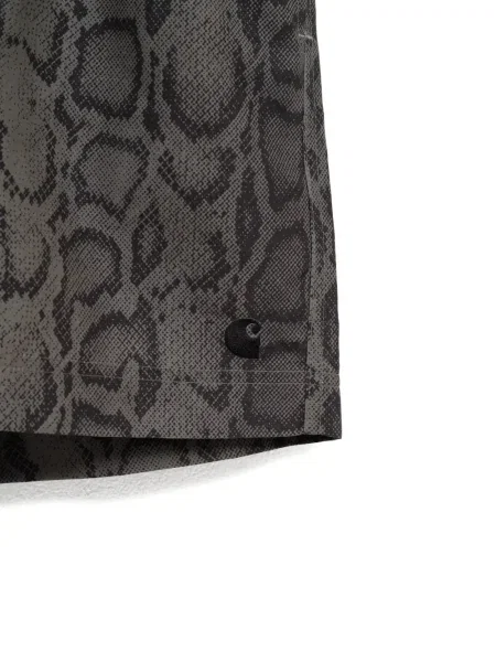 Kraťasy Carhartt Wip s potiskem s hadím vzorem šedé