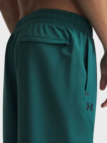 Зауженные брюки Under Armour зеленые