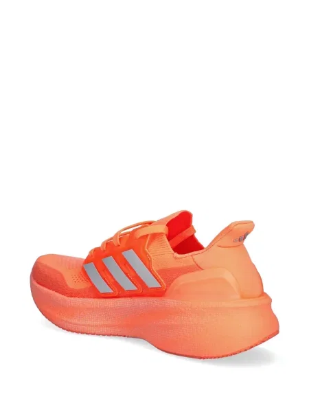 Sneakersy Adidas Predator w paski z dekoltem w serek z kapturem różowe