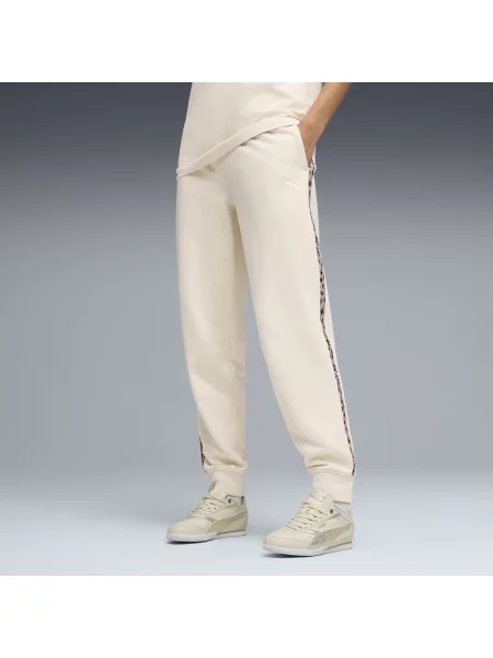 PUMA spodnie Essentials ze zwierzęcym nadrukiem Odzież Biały S beżowe