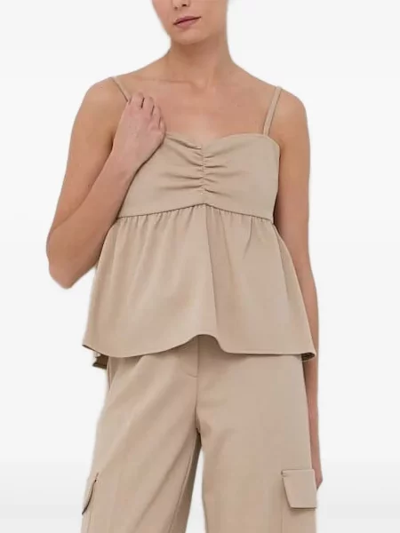 Cu peplum top Notes Du Nord