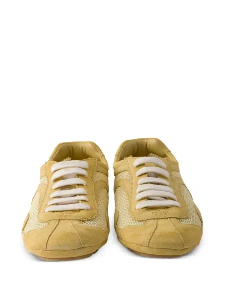Sneakerși Prada din piele de căprioară galben