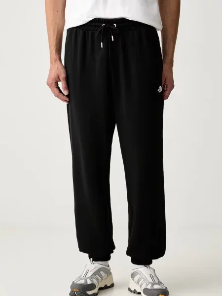 The North Face pantaloni de trening pentru bărbați cu Essential negru