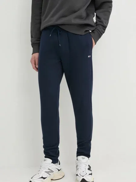 Spodnji del trenirke Tommy Jeans mornarsko modra