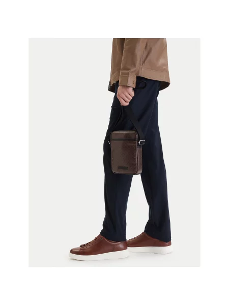 Torbica za okrog pasu Calvin Klein Emblem Aop Coated Slim Reporter rjava