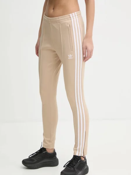 Adidas Originals spodnie do biegania Kobiety XS beżowy