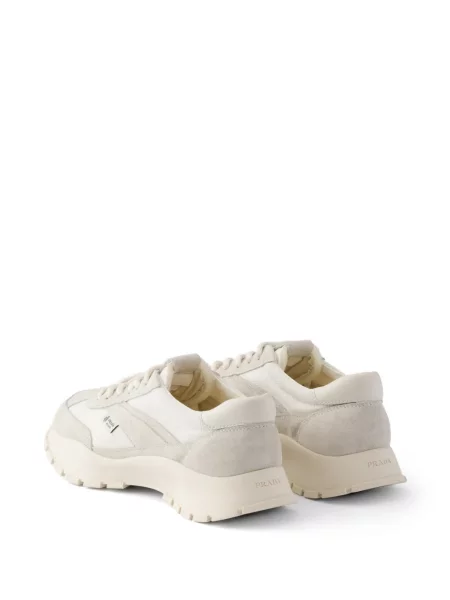 Sneakerși Prada din piele de căprioară