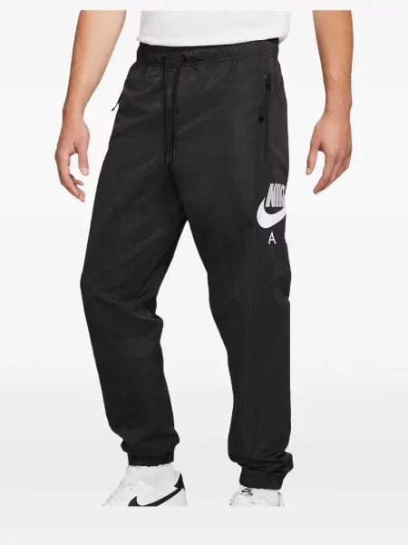Trčanje hlače Nike od flisa s vezom crna