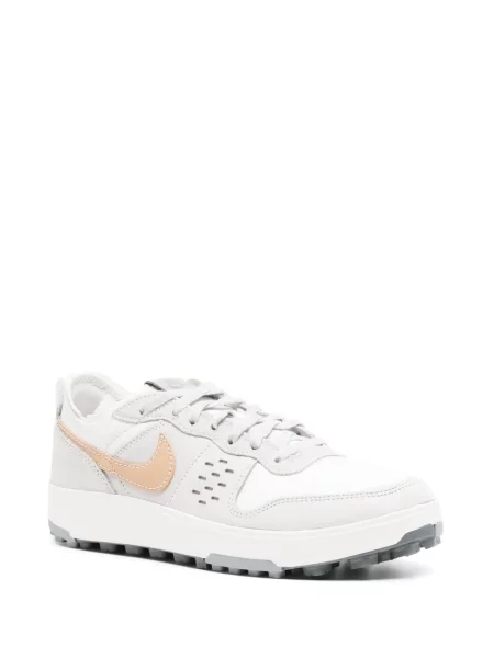 Sneakerși Nike NikeCourt alergare din piele de căprioară auriu