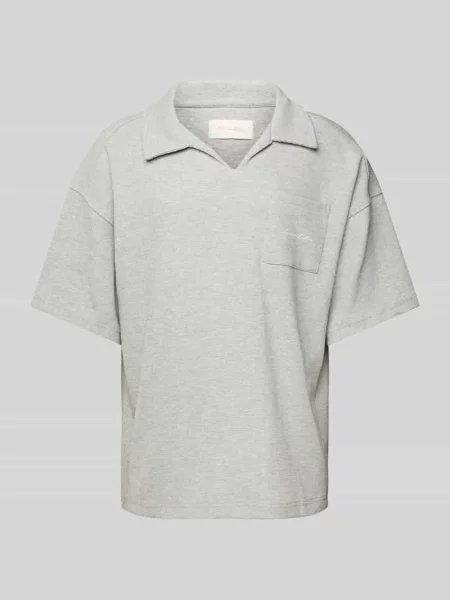 Koszulka polo o kroju oversized z kieszenią na piersi Another Cotton Lab
