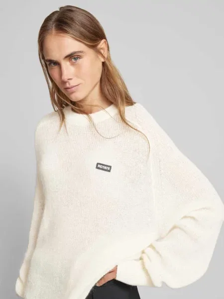 Sweter o kroju oversized z dodatkiem wełny Rotate beżowy