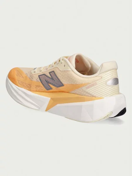 New Balance női futócipő FuelCell Rebel v5 narancsszínű
