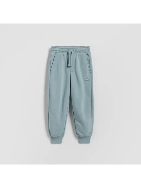 Reserved jogger kalhoty světle modrá