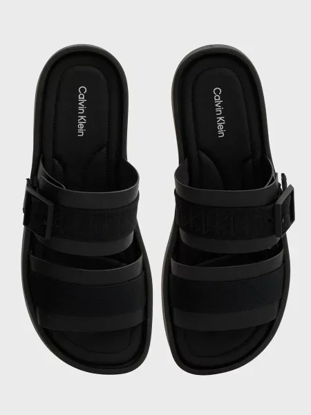 Шлепанцы Calvin Klein с пряжкой черные