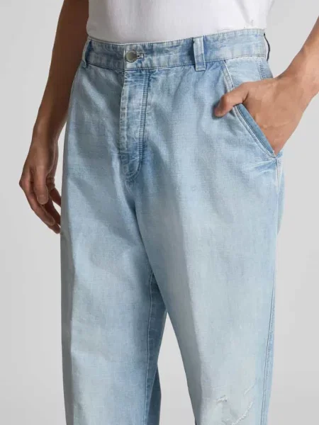 Jeansy o kroju tapered fit z bawełny Closed